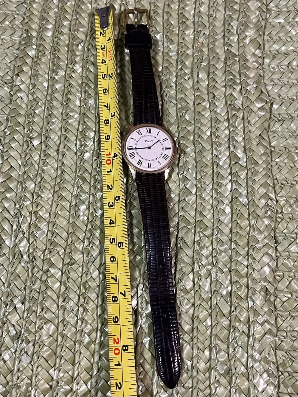 Piaget Silver Case Watch with Black Leather Strap and White Dial